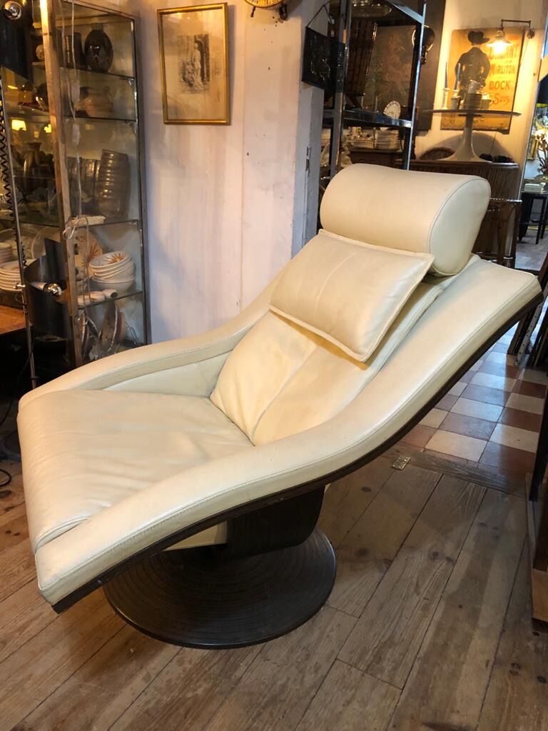 White leather armchair and ottoman