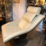White leather armchair and ottoman