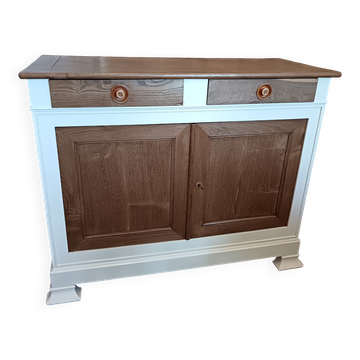 Antique wooden buffet with linen