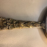 Hand mirror in gilded bronze