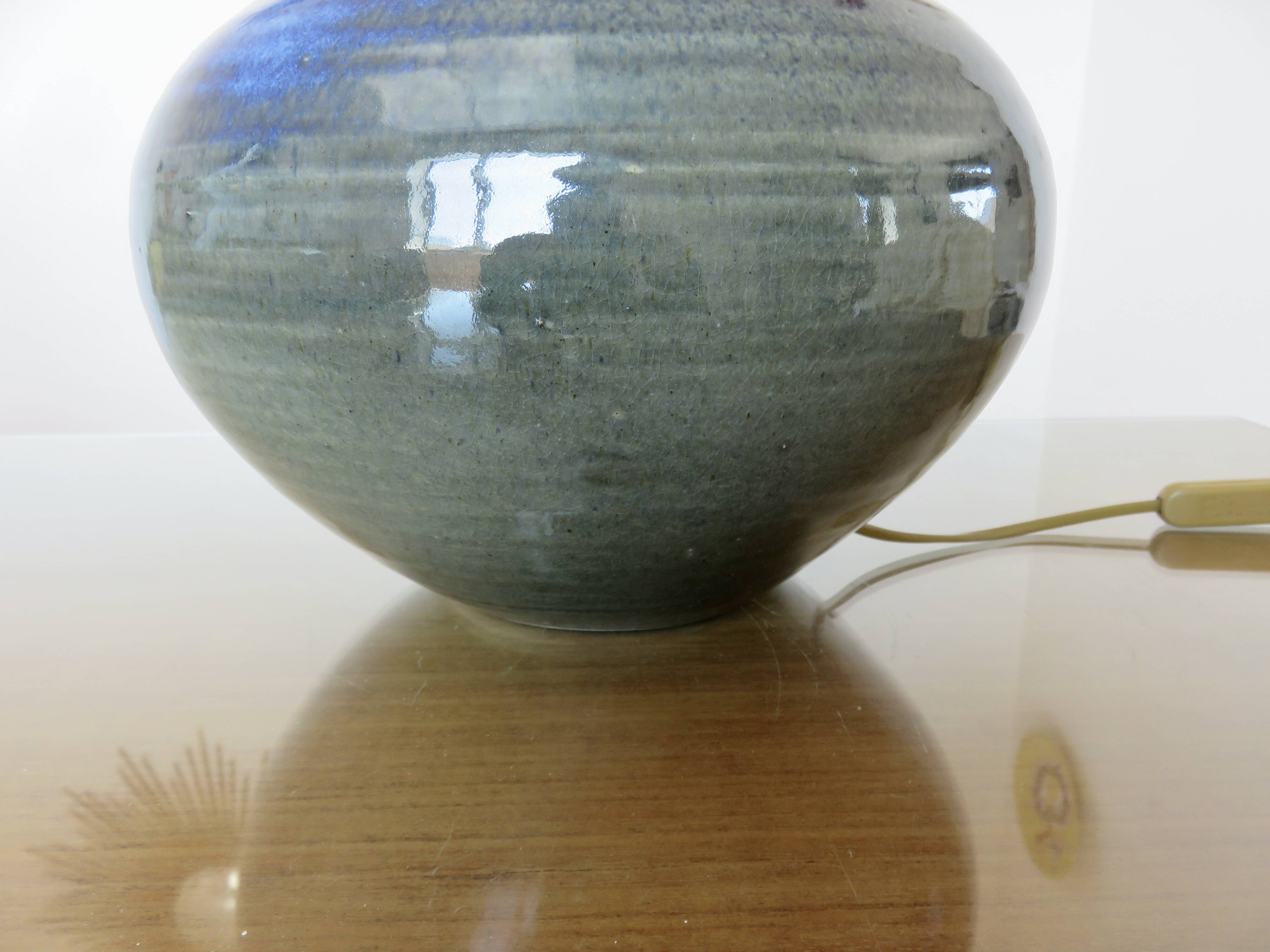 Impressive iridescent blue ceramic lamp with a gradient of green, circa 1960.