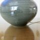 Impressive iridescent blue ceramic lamp with a gradient of green, circa 1960.