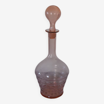 Pink transparent glass carafe with bubble cap