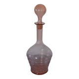 Pink transparent glass carafe with bubble cap