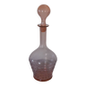 Pink transparent glass carafe with bubble cap