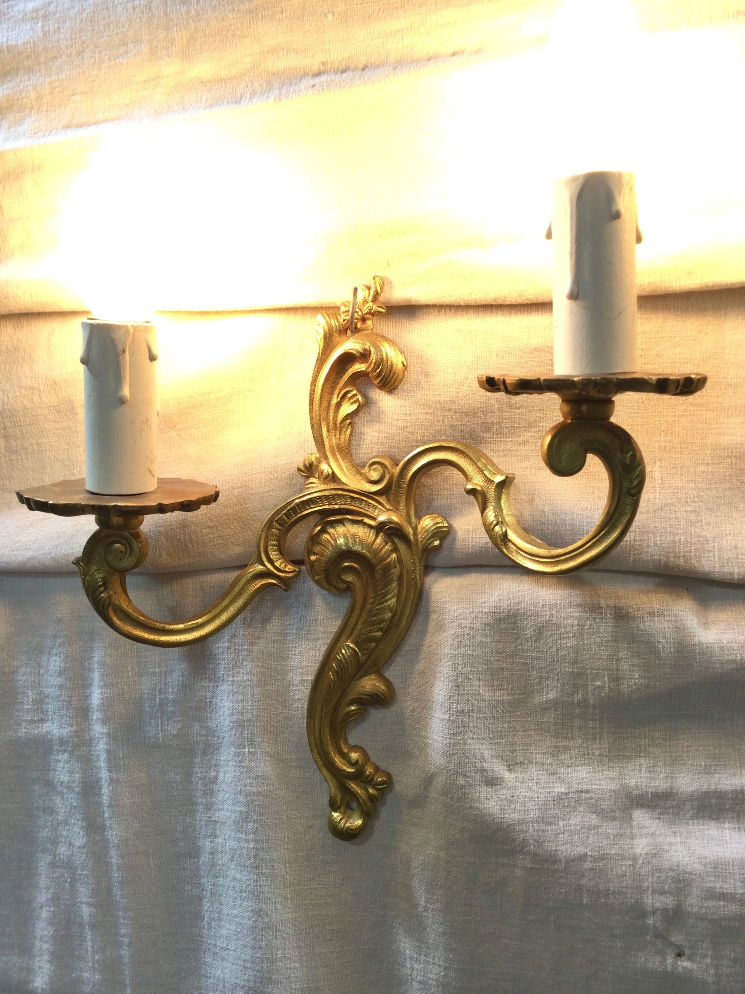 Pair of Louis XV style bronze sconces
