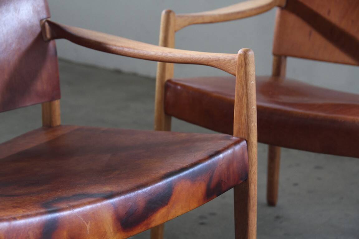 Pair of vintage Per-Olof Scotte "Premier 69" oak armchairs in cognac leather