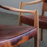 Pair of vintage Per-Olof Scotte "Premier 69" oak armchairs in cognac leather
