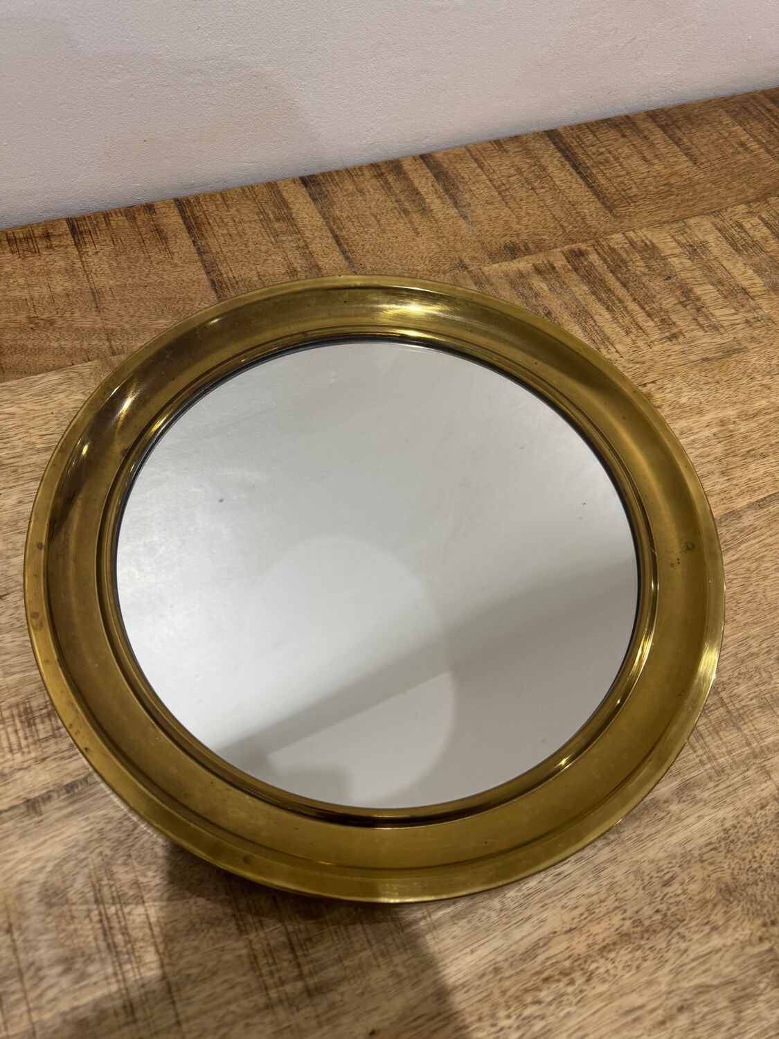 Golden round mirror