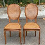 2 Louis XV medallion chairs in solid wood with canes