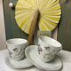 Duo of antique coffee cups