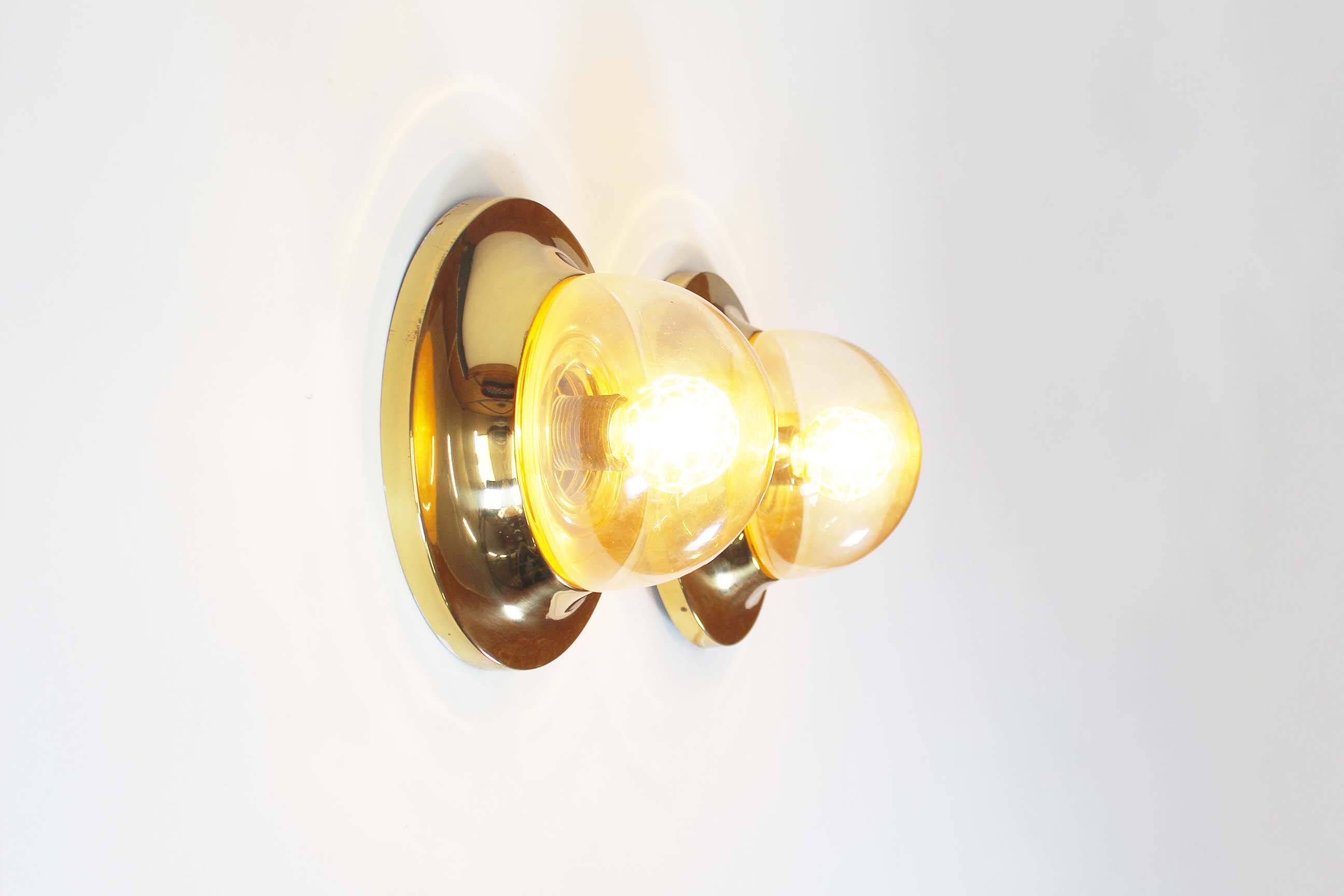 Pair of 1970’s petite brass & glass wall lights