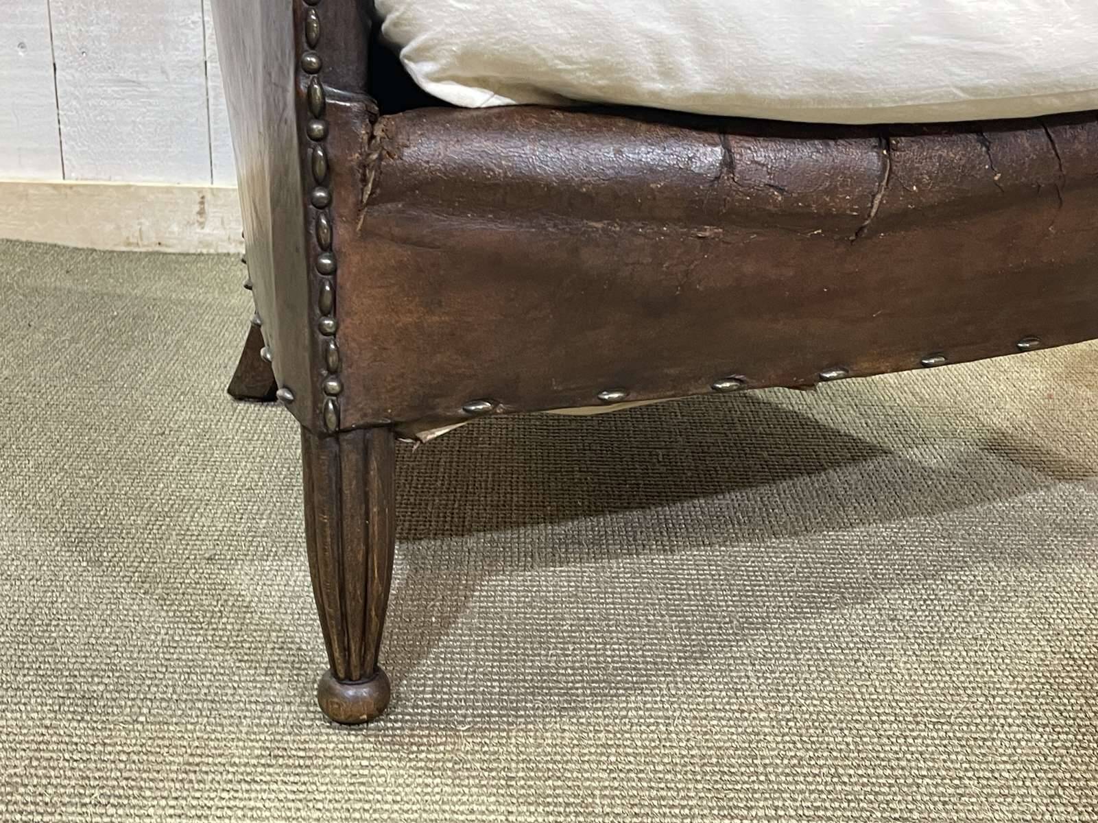 Art Deco period club lounge in leather and fabric seating