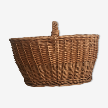 Large woven wicker basket, wood reinforcement