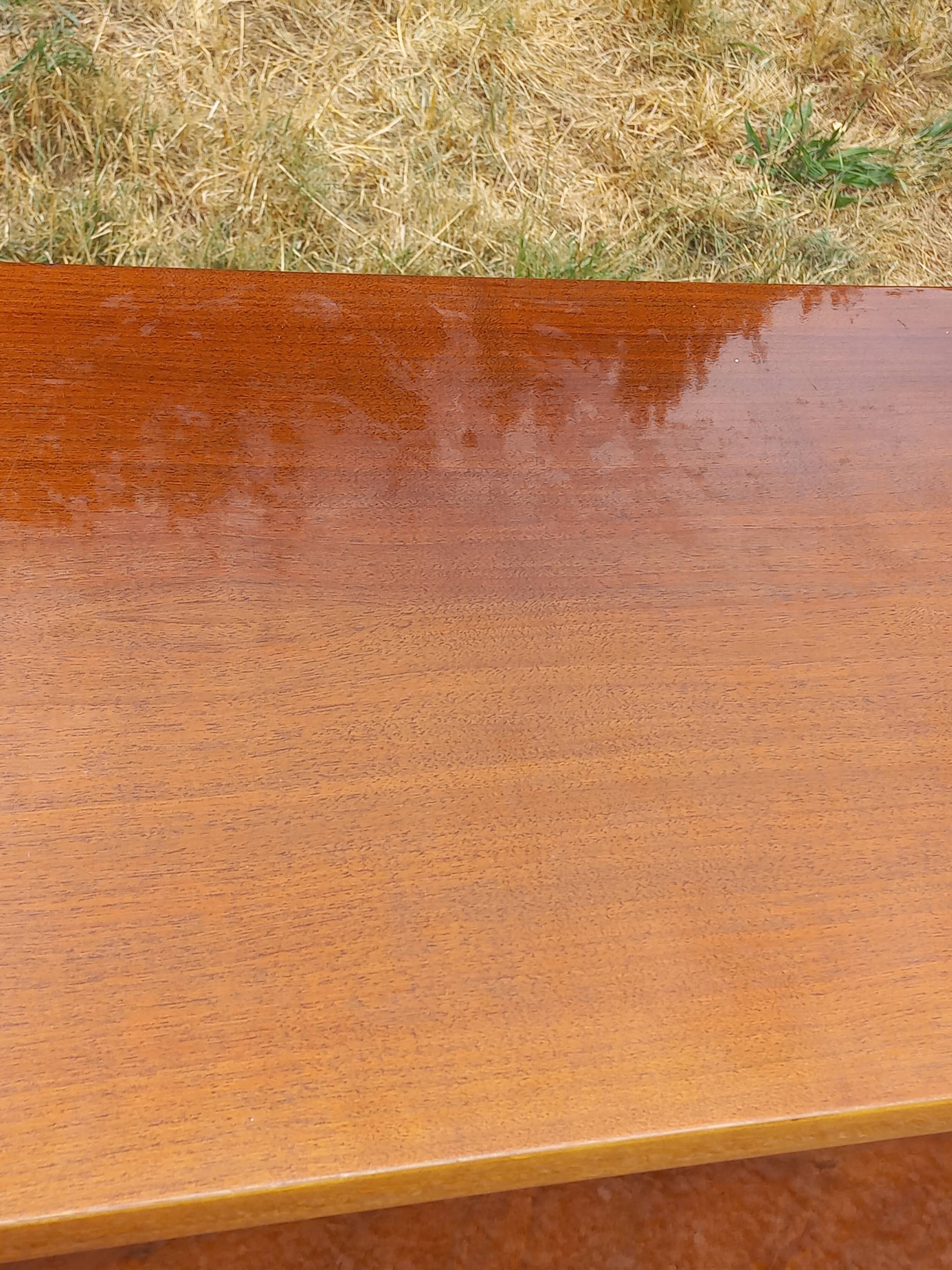 Vintage walnut varnished chest of drawers with 4 drawers from the 1960s.