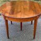 Round extendable dining table Louis XVI in cherry wood from the 1960s.