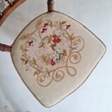 Antique chair turned wood sitting velvet flowers