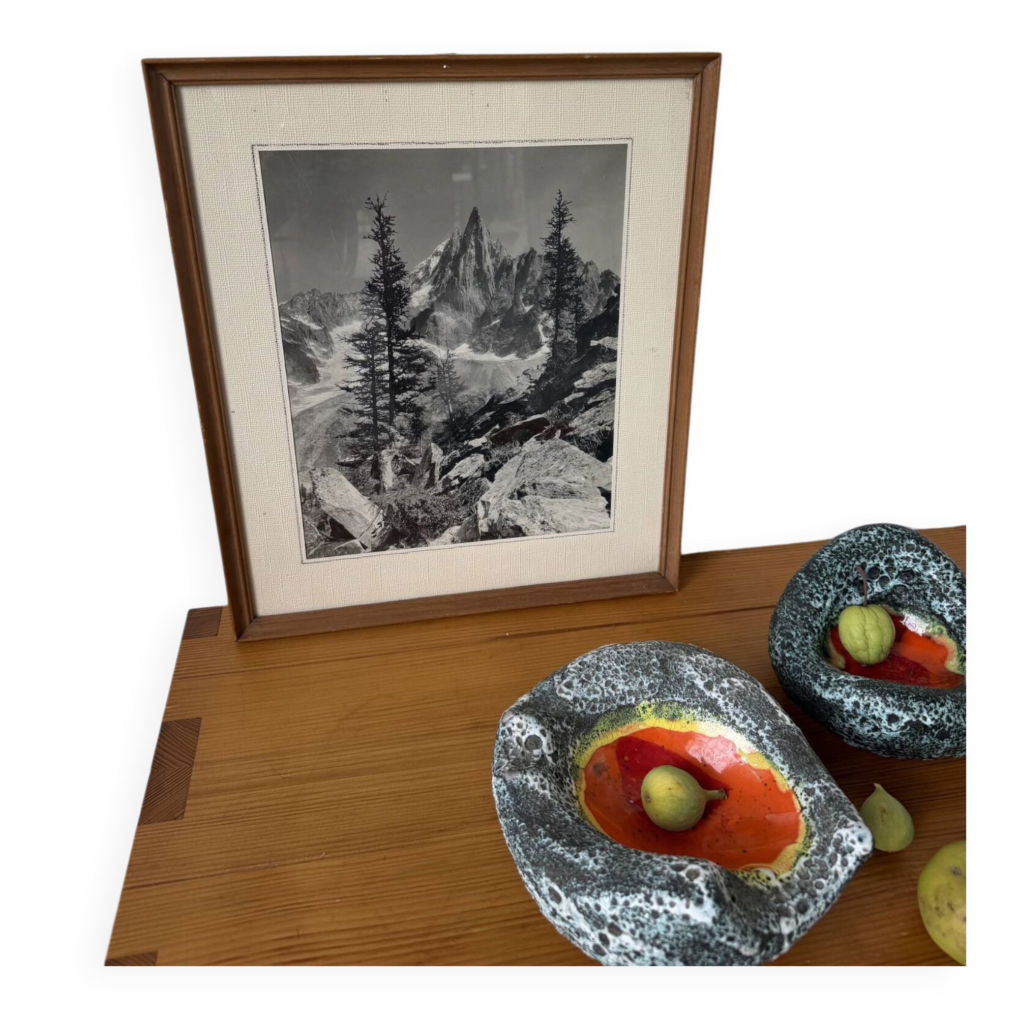 Framed old photo of a mountain landscape.