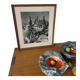 Framed old photo of a mountain landscape.