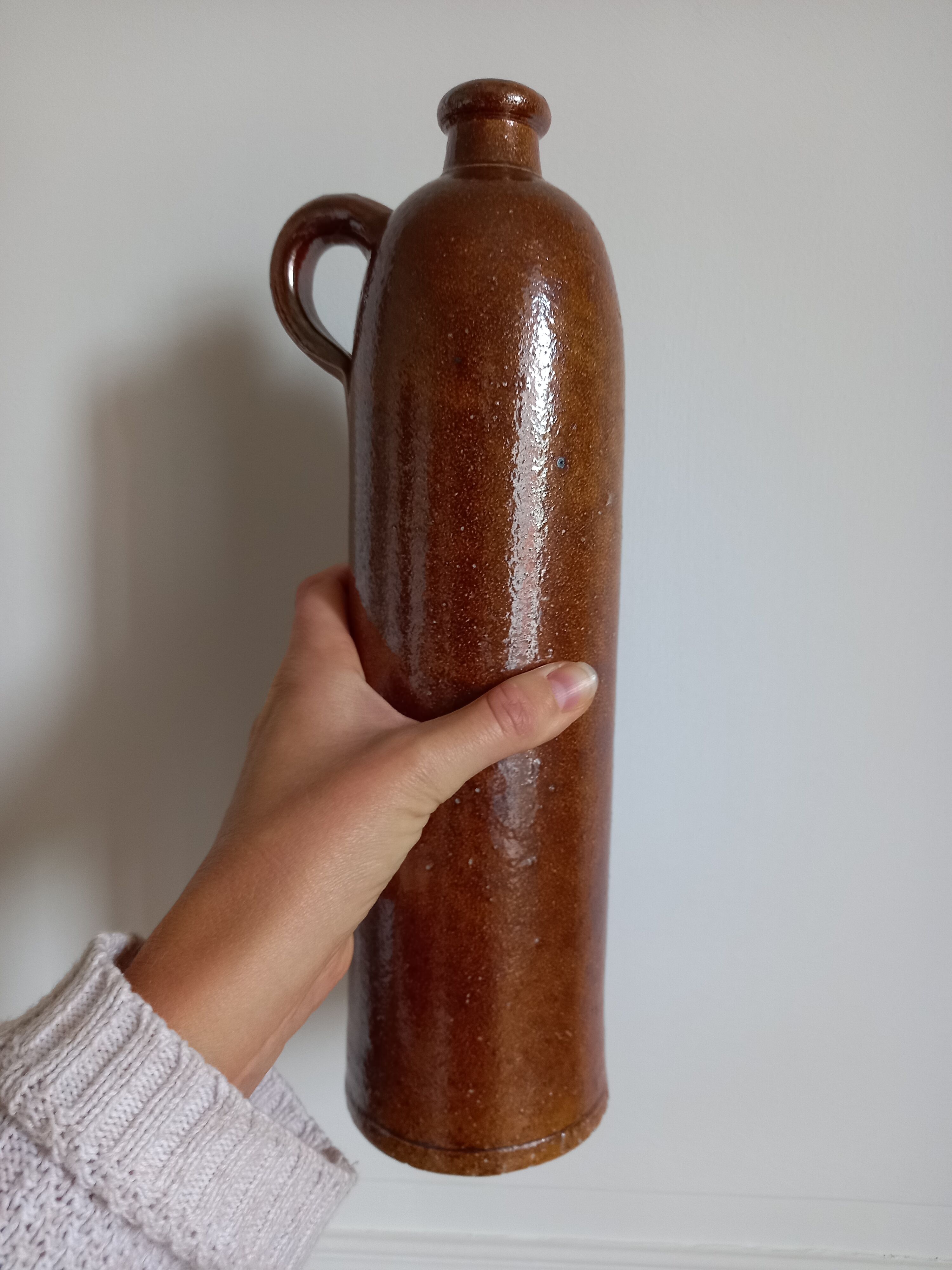 Brown glazed stoneware bottle Amsterdamsche, nineteenth century