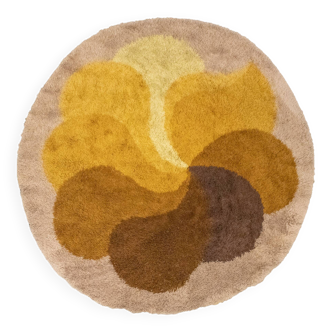 Tapis Desso rond « fleur » orange et marron