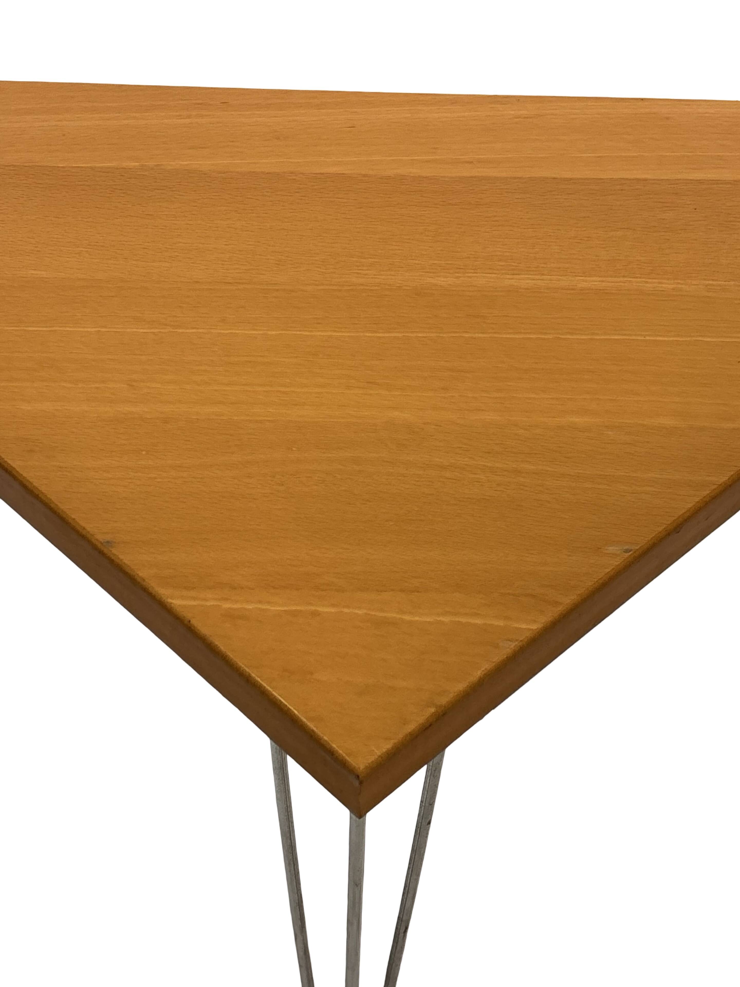 Vintage Danish triangular side table with hairpin legs design