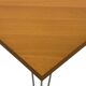 Vintage Danish triangular side table with hairpin legs design