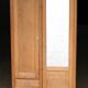 Art Nouveau wardrobe in blond wood with beveled mirror (circa 1909).
