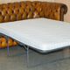 Vintage Chesterfield leather sofa bed, fully restored, circa 1940.