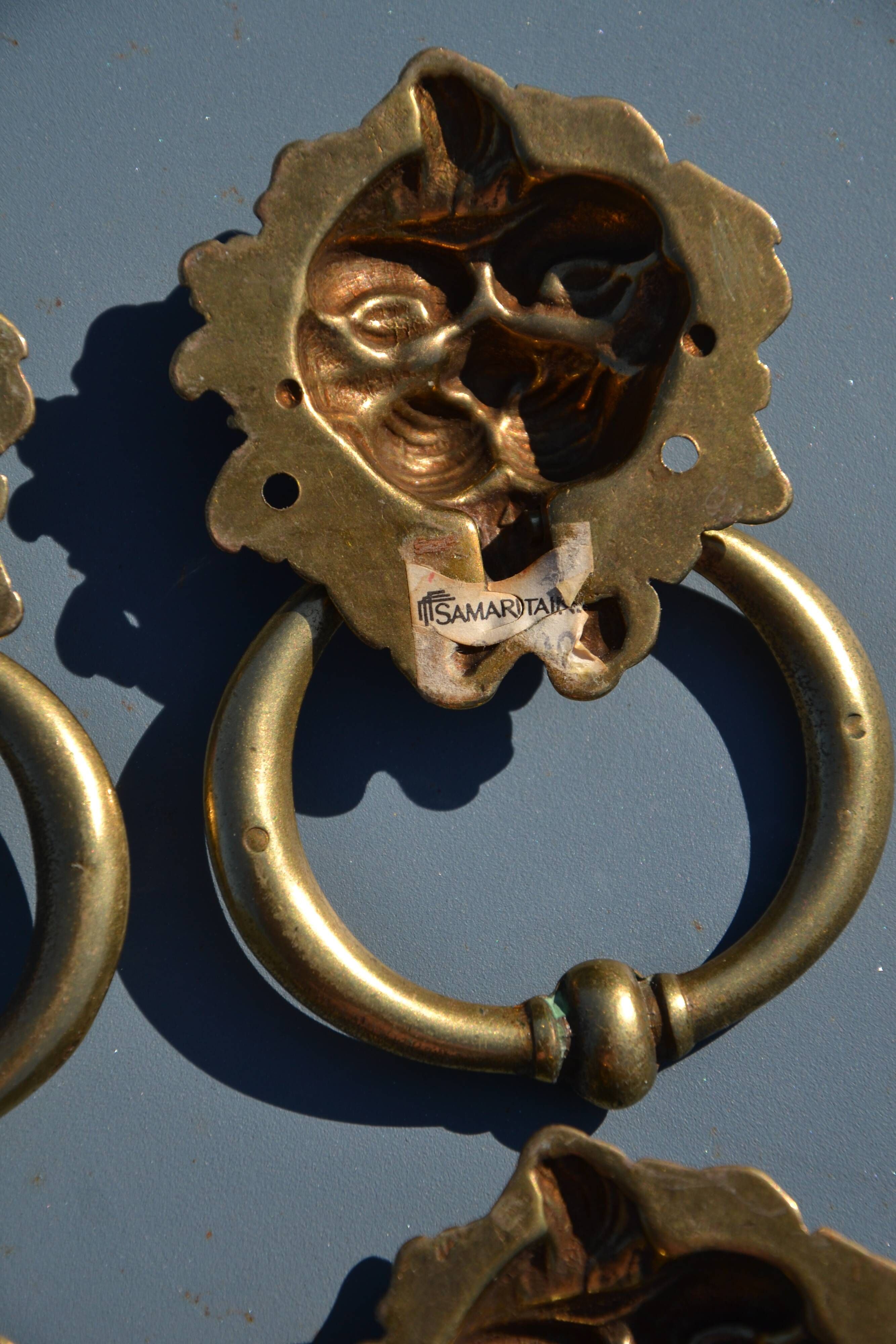 4 antique lion head furniture handles from La Samaritaine.