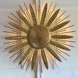 Large golden hammered metal sun wall light with a diameter of 90 cm from the year