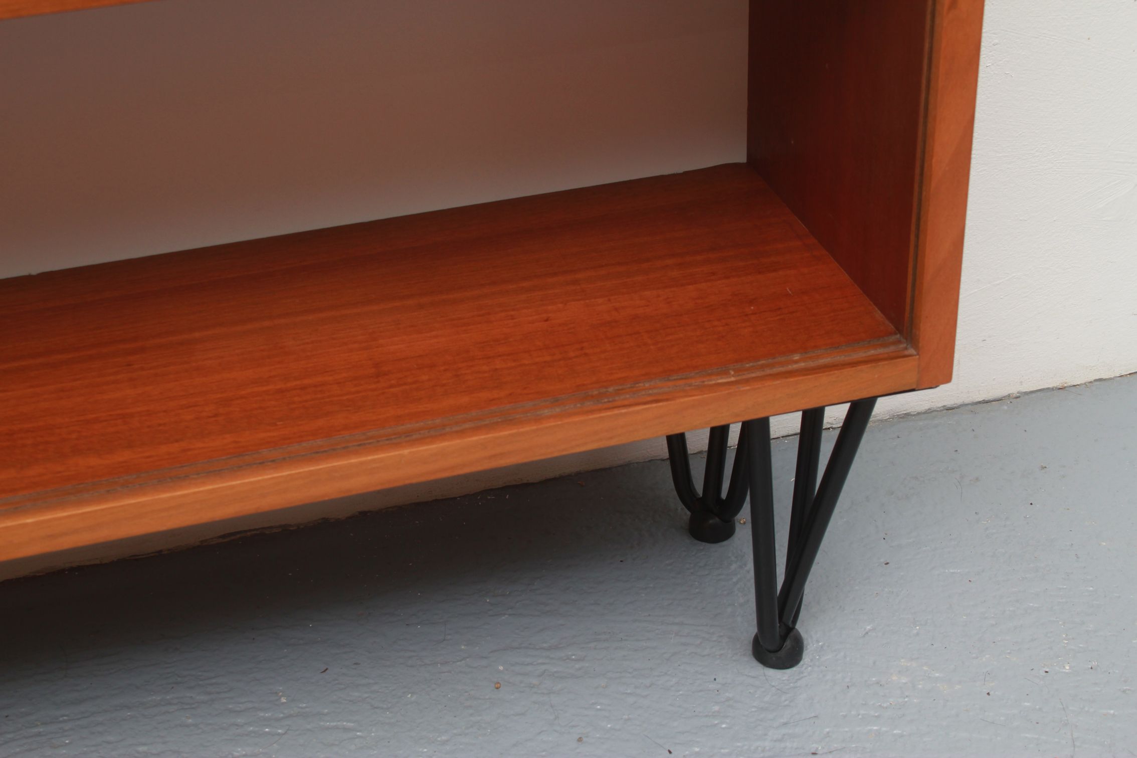 1960s book shelf in walnut, white back panel