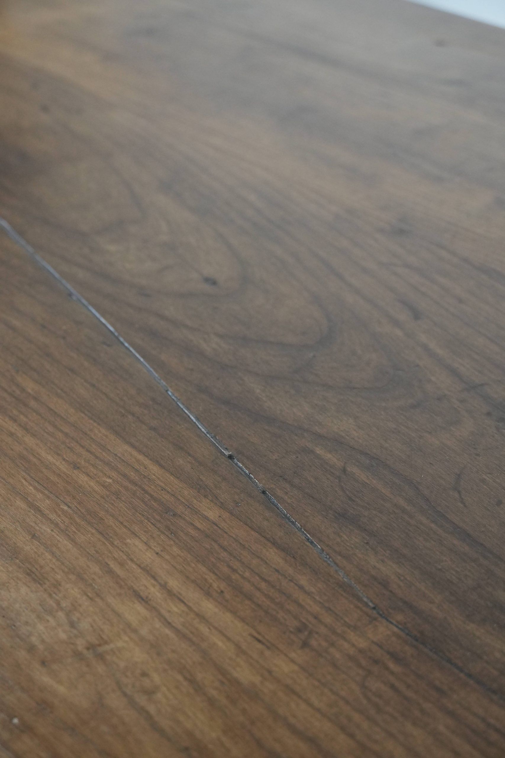 Antique French farmhouse dining table with two drawers and a pull-out board