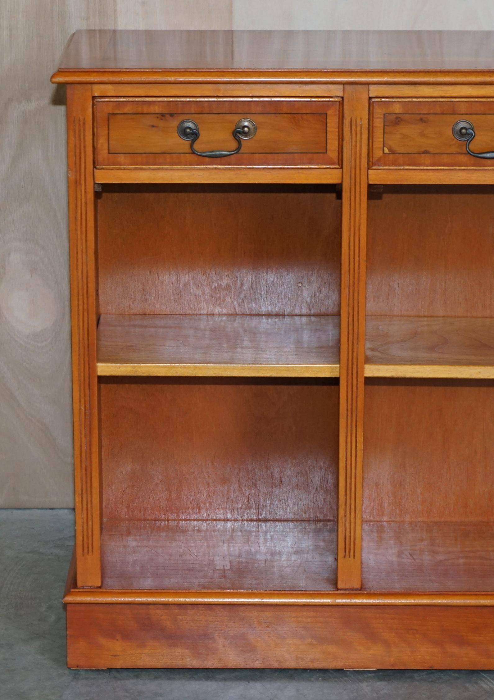 Vintage yew wood library/buffet with three drawers.