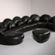 Organically shaped post-modern sectional sofa in black leather