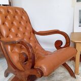 Chesterfield armchair in wood and leather