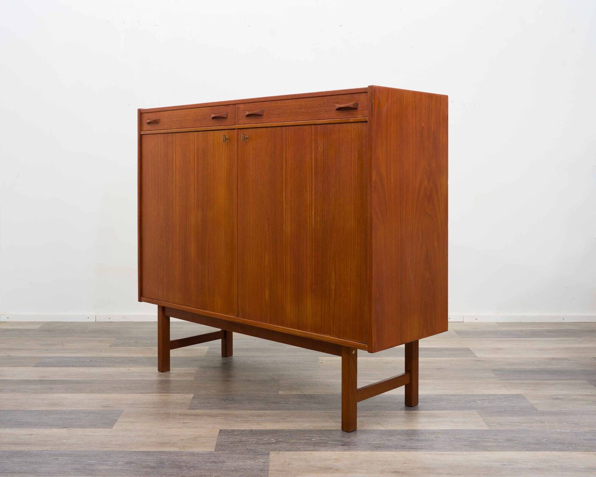 High teak sideboard from the 1960s. Manufacturer: Ulferts, Tibro Sweden, rest