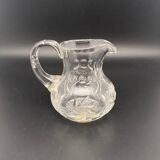 Small carafe/jar in transparent worked glass