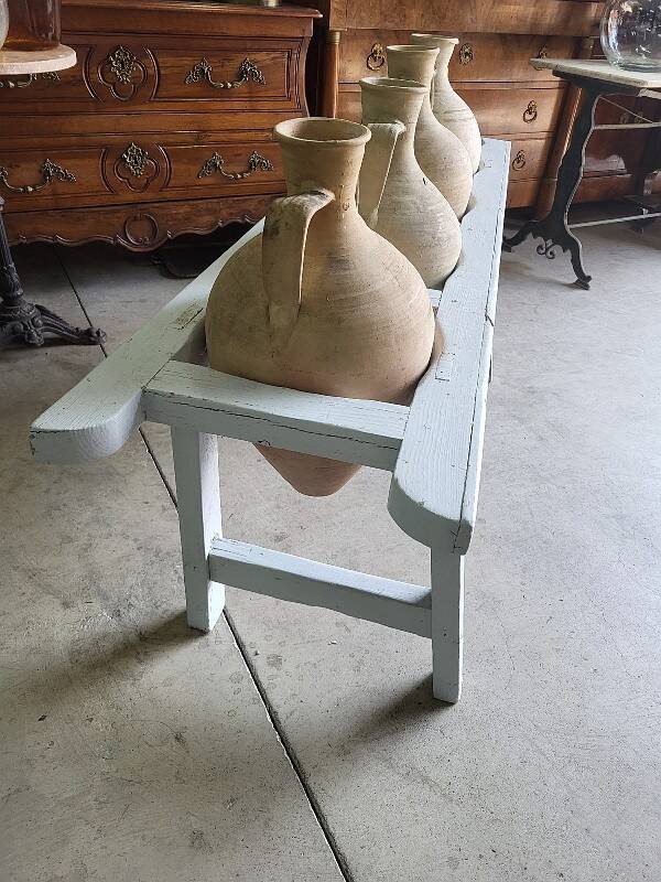 Antique painted wooden jar holder with 4 earthenware jars