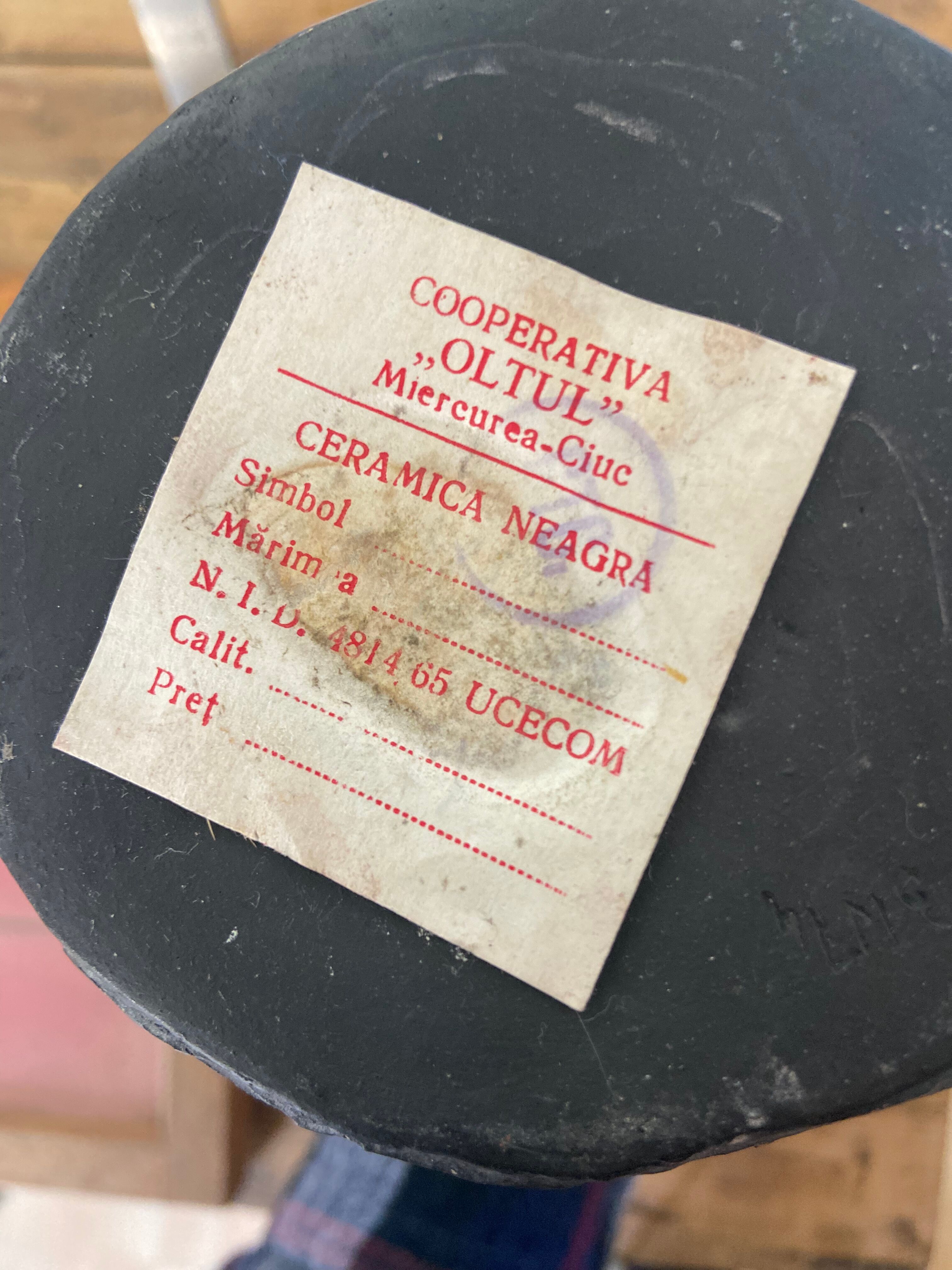 Black ceramic pitcher from the 50s