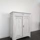 Small buffet with two doors and one drawer in white patinated wood.