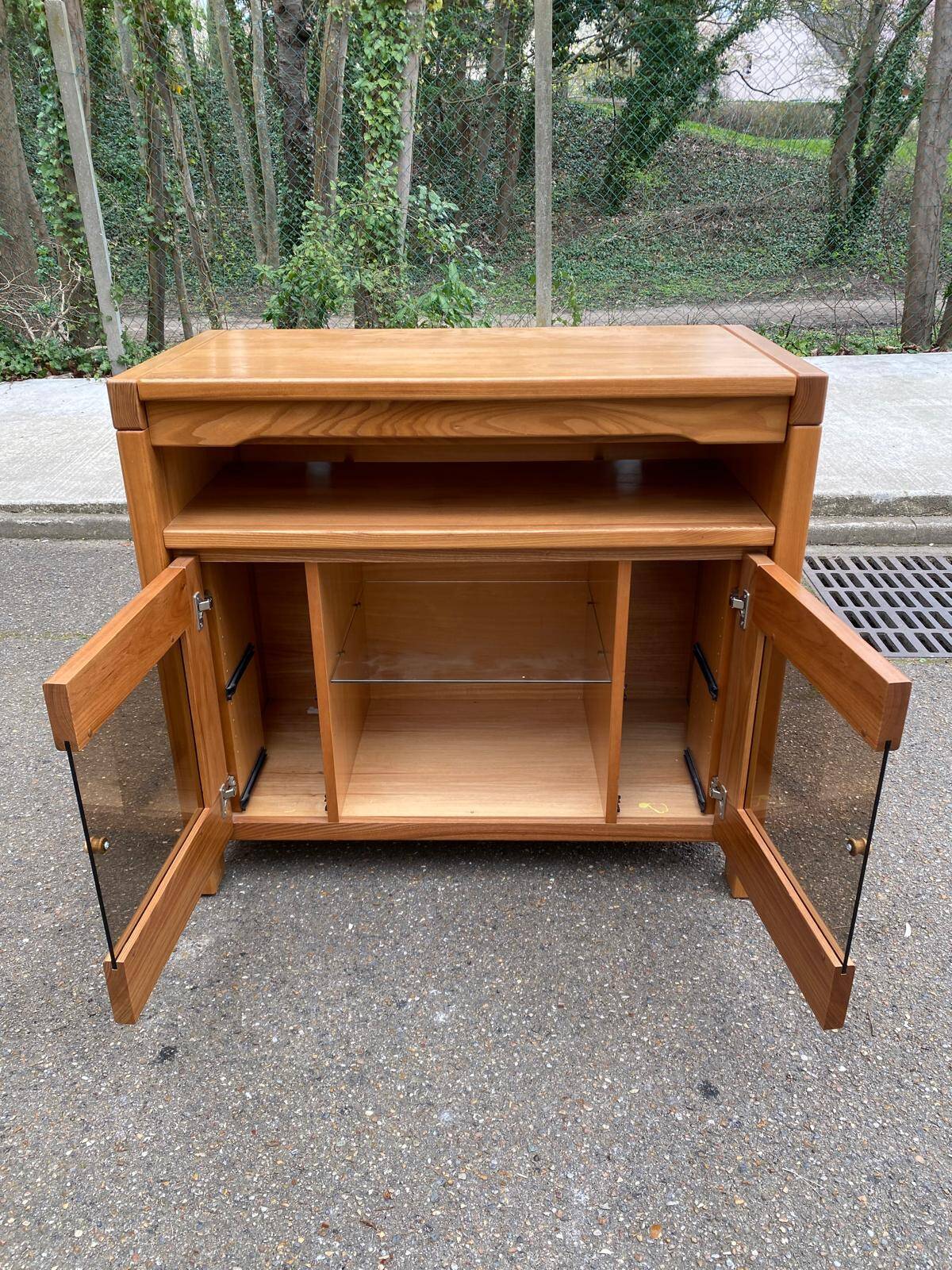 Glass-fronted Scandinavian oak sideboard from the 1980s.