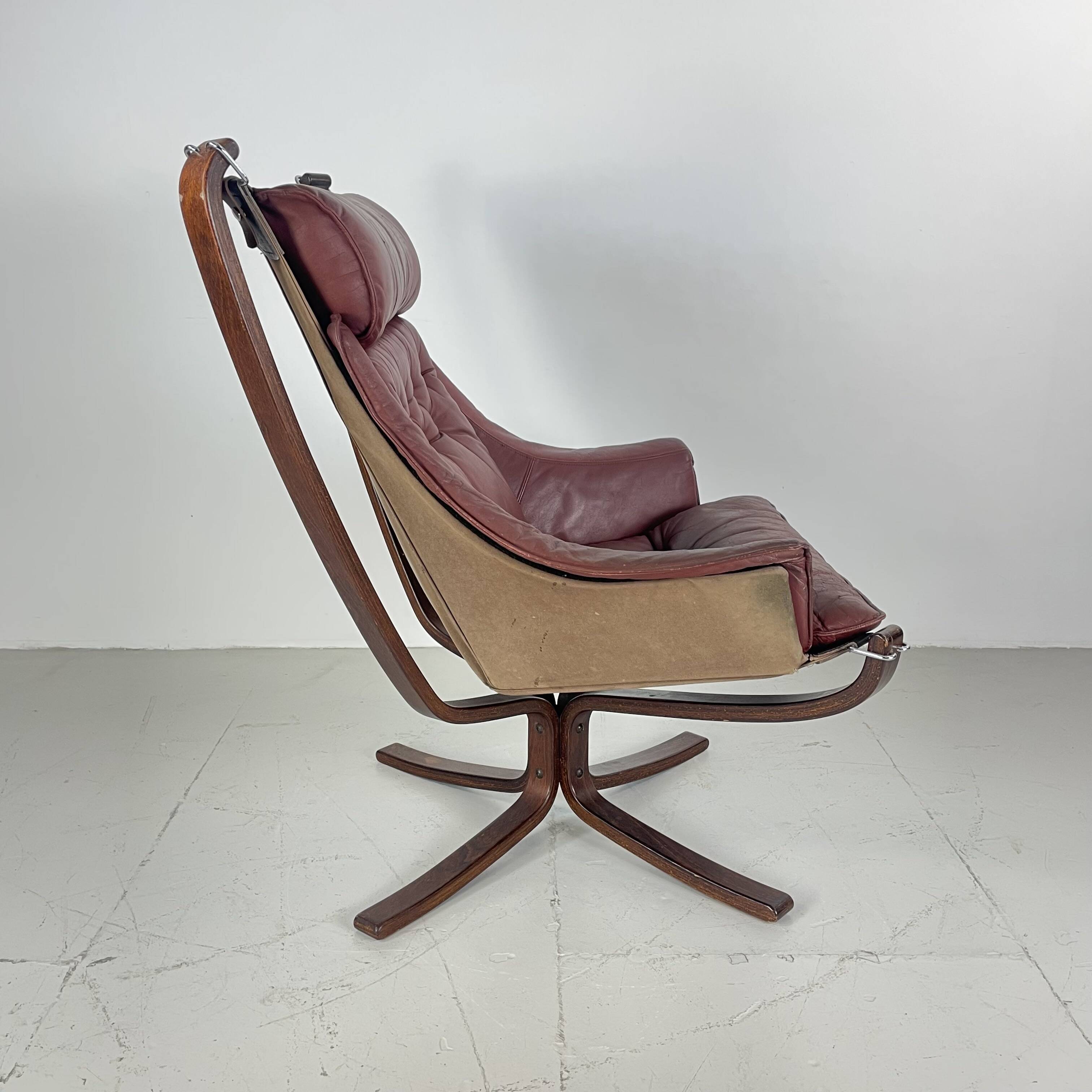 Vintage winged leather high backed Falcon chair designed by Sigurd Resell
