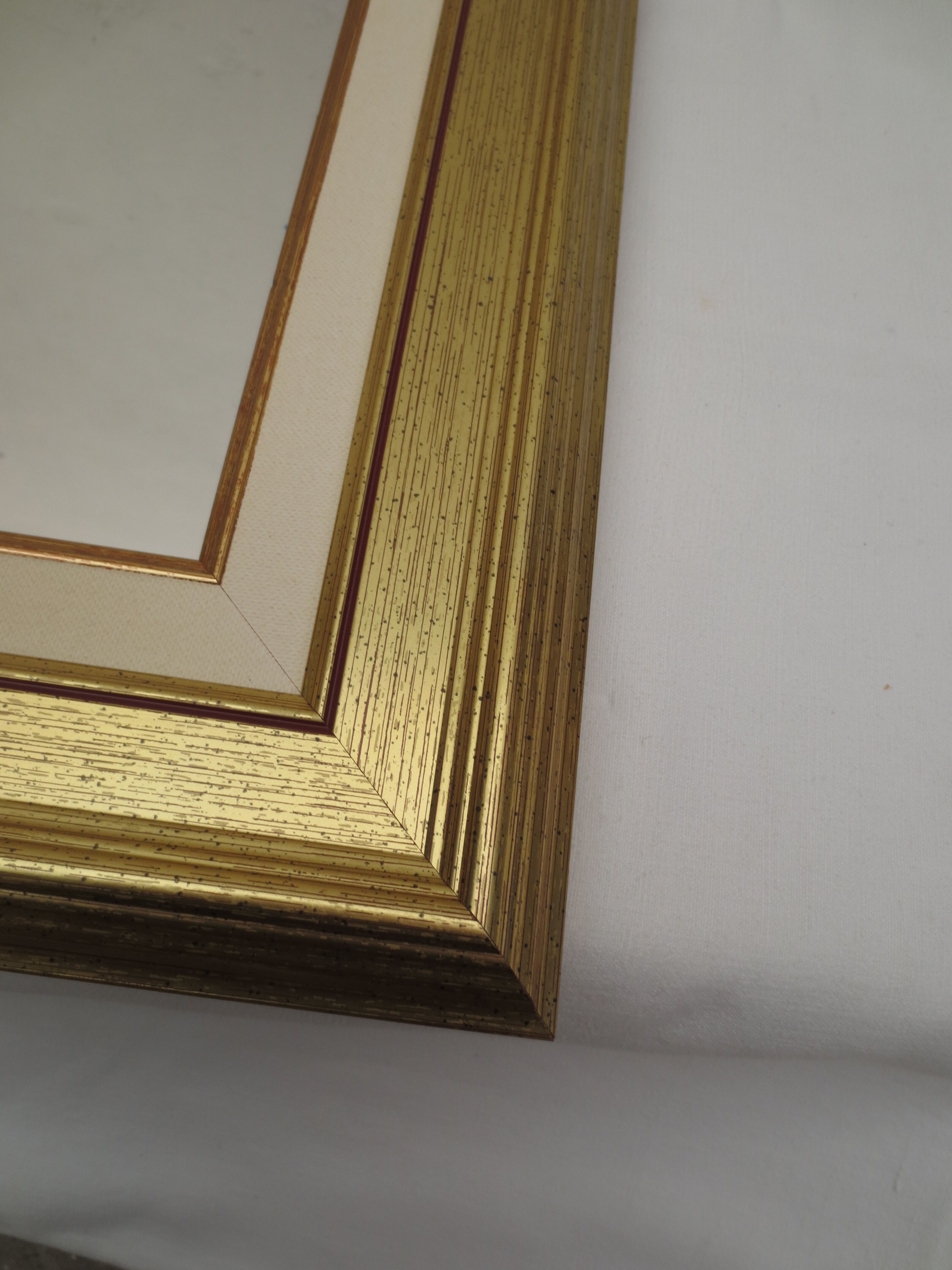 Rectangular mirror, gilded wood tower