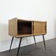 Modernist sideboard with 2 doors in oak veneer.