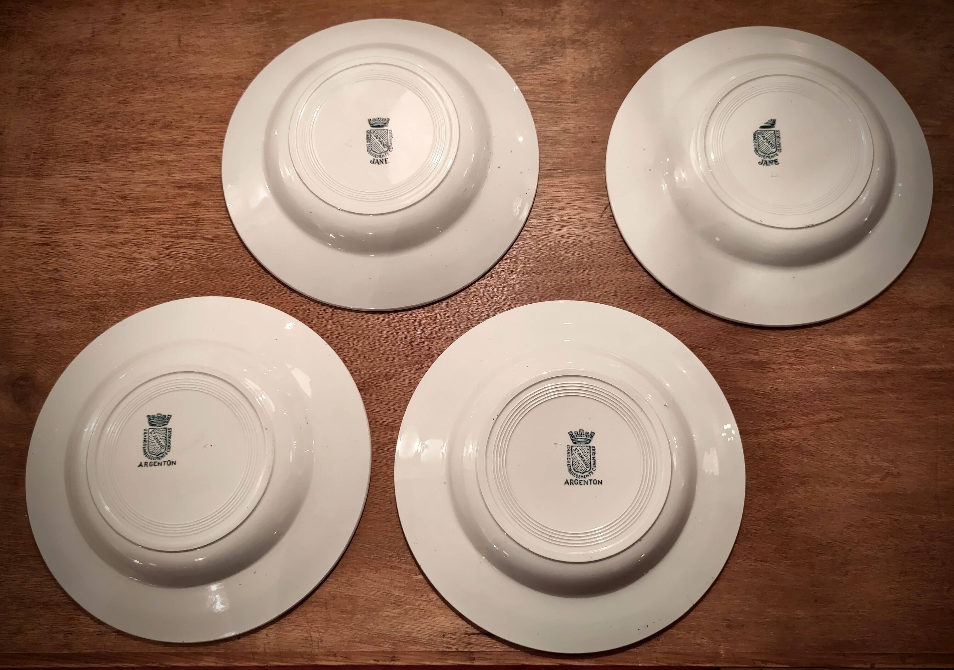 Four Saint Amand plates