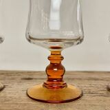 6 small amber stemmed glasses