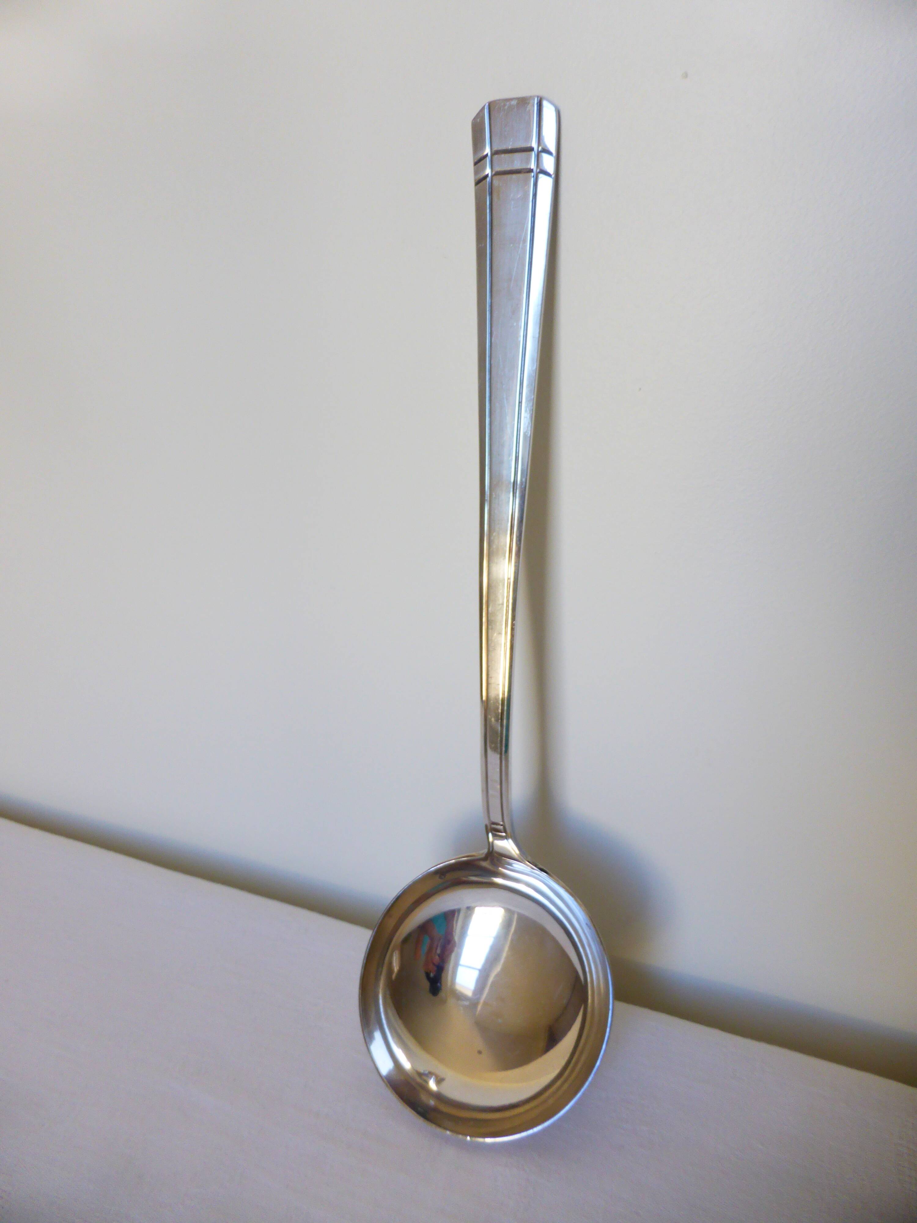 Shabby vintage silver-plated ladle.