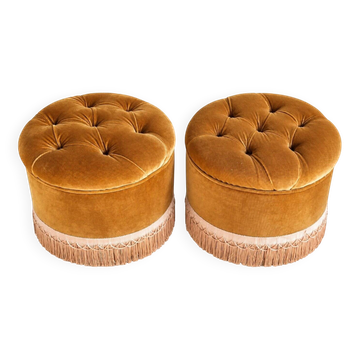 False pair of round Napoleon III poufs in ochre velvet, tufted with fringes.