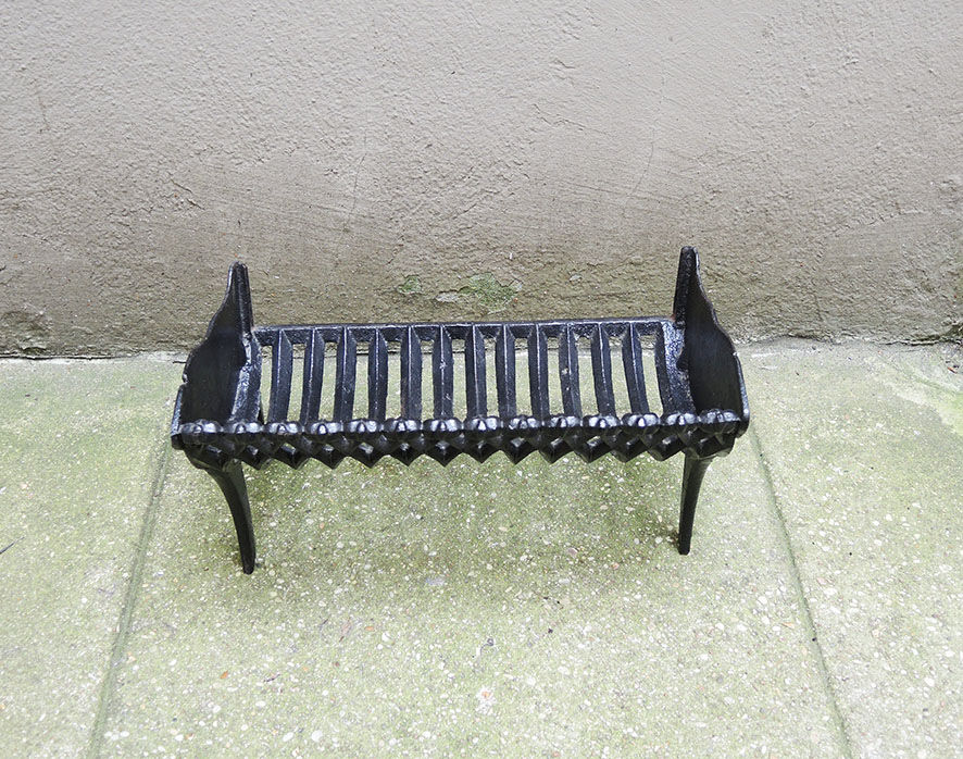 Old gate, cradle with cast iron logs